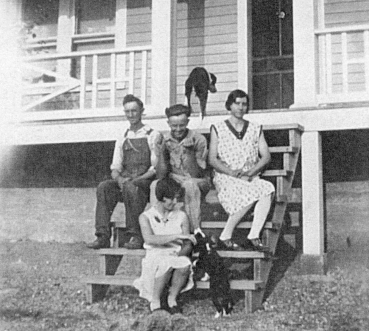 garrettfamily The Garrett Family sitting on the front steps of their house