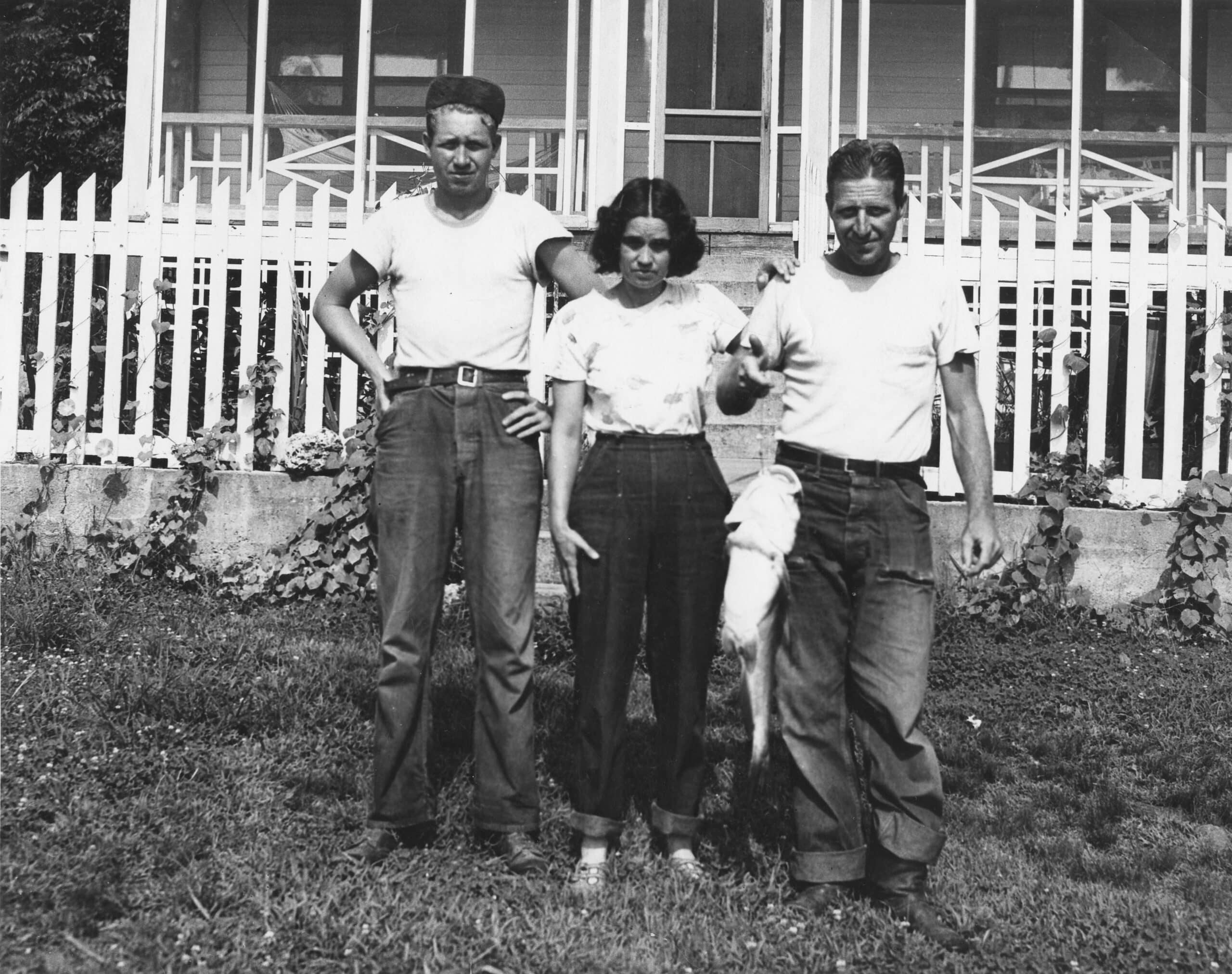 genedicklaura The Garrett Family sitting on the front steps of their house